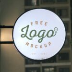 600x0_Free-Round-Signage-on-Building-Mockup-PSD